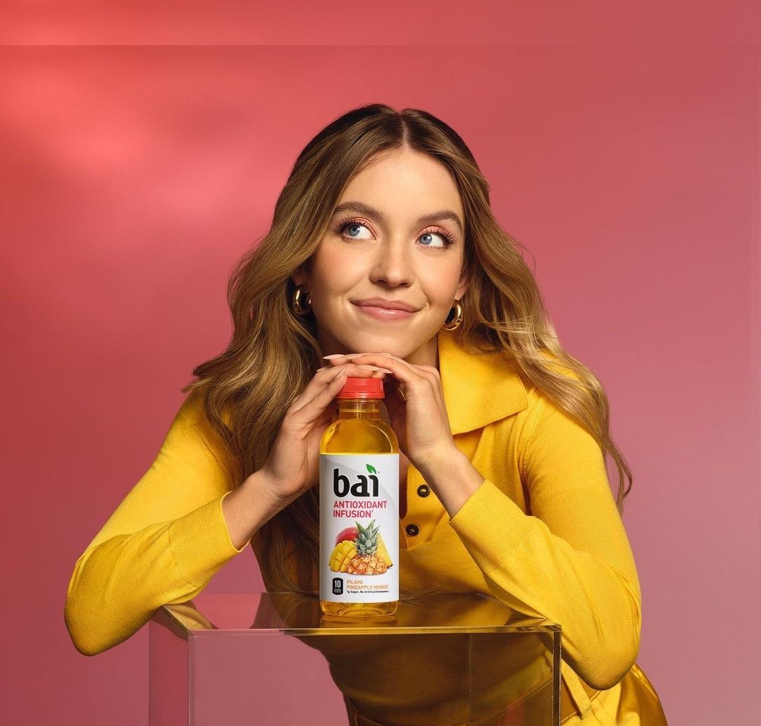 https://www.keurigdrpepper.com/wp-content/uploads/2024/01/Sydney_Sweeney_Cover_Photo_1.jpg